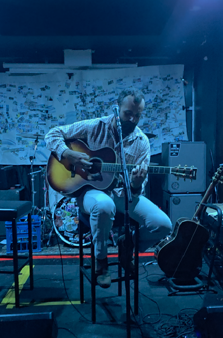 Joey Leigh Wagtail plays an acoustic set on the stage at PFR Lounge for the Too Much Too Young fundraiser event.